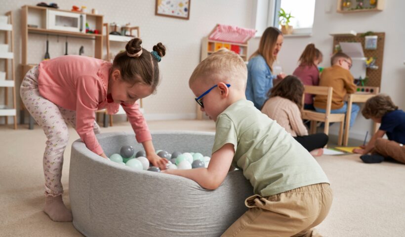 Children playing together in the kindergarten